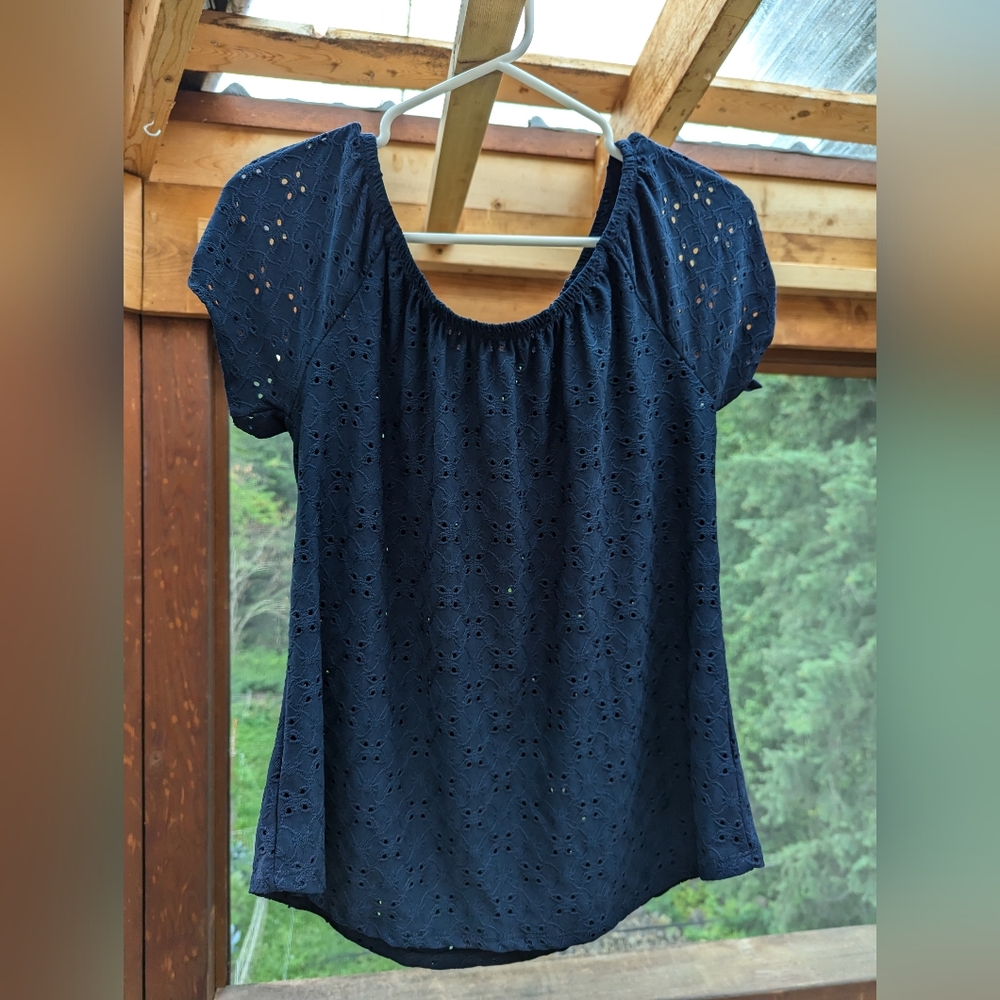 Eyelet top with cold shoulder sleeves